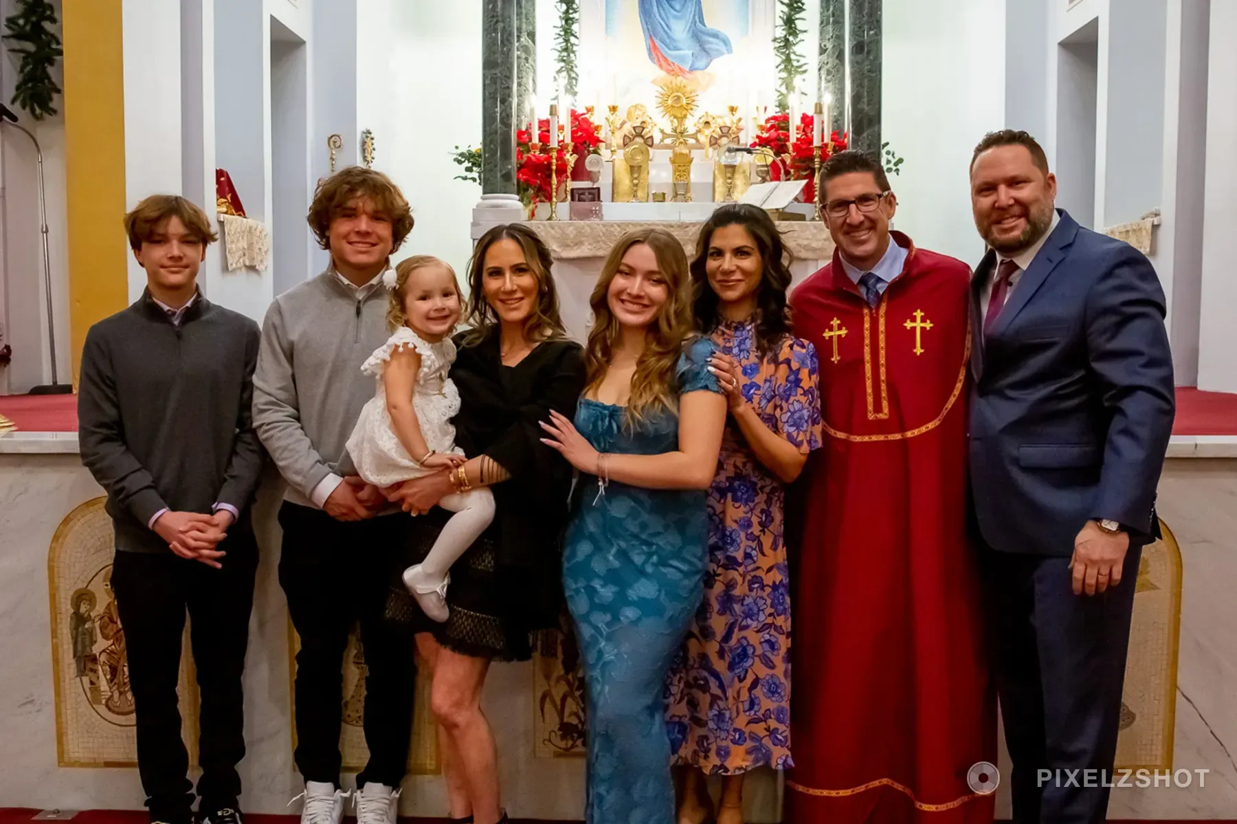 The whole party gathered in front of the altar afterwards for a group portrait, clergy included